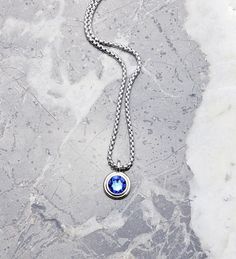 《《  FOR YOUR JOURNEY COLLECTION  》》 THE DETAILS The "SILVER SAPPHIRE COIN" Necklace is designed with an incredibly detailed Silver Stainless Steel Mini Stepped Coin Pendant, with a luxurious Cushion Cut Sapphire Cubic Zirconia Gemstone, hung from a Silver Stainless Steel Box Chain available in your choice of length! GEMSTONE BENEFITS SAPPHIRE: Known as the Stone of "WISDOM & PROSPERITY", often worn for its abilities to stimulate concentration, while enhancing Creativity & depth of though, bringi Mens Stone Pendant, Silver Sapphire Round Pendant Necklace, Blue Sapphire Pendant For Men, Luxury Men's Coin Pendant Jewelry, Blue Sterling Silver Necklace With Square Pendant, September Birthstone Necklace, Necklace Length Chart, Coin Pendant Necklace, Jewelry Care Instructions