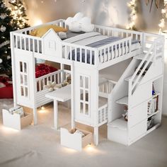 there is a white bunk bed with stairs to the top and below it, next to a christmas tree