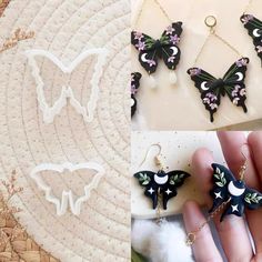 the butterfly earrings are being displayed next to each other on a table with white and black decorations