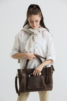 "Leather laptop bag, Graduation gift for daughter Personalized gift for women, Leather handbag, gift from mom, Leather crossbody ADD to cart MAKEUP BAG: https://etsy.me/2VTLIXI Excellent craftsmanship, amazing quality and the perfect size, make this laptop bag your favorite bag ever. These leather messengers are completely handmade with great care. Every knick, wrinkle and scratch is unique to the leather and adds to its character. You will absolutely love this bag! SIZES: ✦ EXTRA LARGE Size (XL Large Capacity Crossbody Satchel As Gift, Gift Satchel With Leather Handles And Top Handle, Gift Top Handle Satchel With Leather Handles, Laptop Bag With Sleeve For Everyday Use, Large Capacity Tote Satchel As Gift, Everyday Laptop Bag With Sleeve, Satchel Shoulder Bag As A Gift, Brown Satchel With Removable Pouch As Gift, Top Handle Satchel With Removable Pouch As Gift