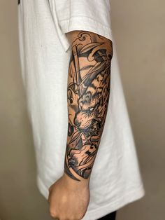 a person with a tattoo on their arm