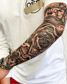 a man with a tattoo on his arm