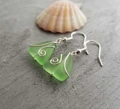 "Aloha! These design shows my love for this beautiful island of Hawaii. This item will be made to order and shipped directly from Hawaii. This is sea glass earrings with silver hooks. This handmade in Hawaii jewelry gift is from cultured sea glass that are specially formed into its shape for jewelry making. Each comes with a gift box with \"handmade by yinahawaii\" stamp and a ribbon wrapped as shown in the 2nd photo, ready to give as gift. I also offer Free gift messaging with the order. Please Green Dangle Jewelry For The Beach, Handmade Sea Glass Green Earrings, Green Sea Glass Earrings For Gift, Green Jewelry With Matching Earrings For The Beach, Green Recycled Glass Earrings For Beach, Green Ocean-inspired Nickel-free Jewelry, Green Sea Glass Wire Wrapped Jewelry, Green Recycled Glass Jewelry For The Beach, Recycled Glass Green Jewelry For Beach