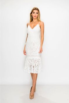 This white, lace, form-fitting dress is the perfect party dress or a dressy date night option. It's super cute, but also very comfortable. It comes with built-in padding so you don't have to worry about picking out the perfect bra. It makes looking good - effortless. *** underlayer of dress is tan instead of white as pictured. Lace Midi Dress With Sweetheart Neckline For Night Out, Feminine Delicate Lace Midi Dress For Parties, Summer Night Out Dress With Delicate Lace, Elegant Midi-length Lace Mini Dress, Elegant Fitted Midi Dress With Delicate Lace, Fitted Flirty Dress With Scalloped Lace, Flirty Delicate Lace Summer Dress, Fitted Midi Dress With Delicate Lace For Party, Fitted Brunch Lace Dress With Scalloped Lace