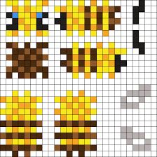 a cross - stitch pattern of a yellow and brown cat with big eyes on it's face