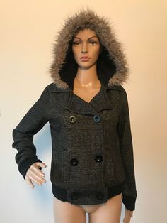 Wet Seal Dark Gray Cotton Blend Hooded Coat This jacket is in excellent condition with no flaws to note. It features an attached hood with faux fur trim, a double breasted button closure, two side pockets, and stretchy ribbed fabric at the waistband and cuffs. The body and hood are lined in a super soft black faux fur. This is machine washable. This jacket is marked a size S, but please check the measurements below as sizing varies from maker to maker. Lying flat, it measures 17 inches from shou Fall Hooded Jacket With Faux Fur Trim, Fall Faux Fur Trim Hooded Jacket, Casual Hooded Jacket With Faux Fur Trim For Fall, Casual Fall Hoodie With Faux Fur Lining, Fall Pea Coat With Detachable Hood, Black Faux Fur, Hooded Coat, Wet Seal, Grey Cotton