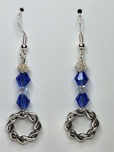 PRODUCT STYLE:     Blue Swarovski Bicone Dangle Earrings  DESCRIPTION: These earrings are made from Swarovski crystal bicones beads with a round silver metal finding. The earrings would make a great addition to your collection! Blue Round Crystal Earrings In Metal, Silver Beaded Earrings With Faceted Beads, Silver Round Beaded Earrings With Faceted Beads, Silver Beaded Crystal Earrings, Silver Crystal Earrings With Faceted Beads, Acrylic Nails Almond Shape, Almond Acrylic Nails, Almond Shape, Beaded Jewelry Designs