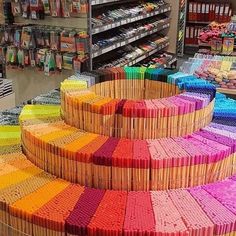 baskets are stacked on top of each other in a store