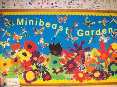 a bulletin board with colorful flowers and butterflies in the middle that says, minnesota east garden