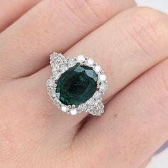 This gorgeous statement ring features a 3-carat emerald gemstone of size 11x9mm with natural earth-mined diamonds, all set in solid 14K gold. This beautiful ring can be a beautiful May birthstone gift for your loved ones! This ring is made with solid 14K Gold and naturally Earth-mined SI / G-H diamonds. As listed, this ring is ready to ship. If you're interested in purchasing this setting with a different center stone please message us! Designer Silver Jewellery, Jewelry Showcases, May Birthstone, Birthstone Gifts, Emerald Gemstone, 3 Carat, Natural Earth, Beautiful Ring, Earring Findings