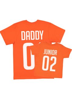 Surprise the dad in your life with these custom dad and son matching jersey style shirts. The father/son will love a pair of matching, cotton, relaxed fit shirts in orange. Look good, feel good - and make a real statement this season! Who said matching had to be boring?! Customize the tops with any name and name in either white or gold wording! Details 100% cotton unisex, relaxed fit orange color short sleeve length shirts sold individually printed in Philadelphia, PA Customize this adorable set Casual Tops For Game Day On Father's Day, Orange Crew Neck T-shirt With Team Name, Casual Orange Tops For Game Day, Orange Cotton T-shirt For Game Day, Cotton T-shirt With Team Name For Father's Day, Father's Day Cotton T-shirt With Team Spirit, Father's Day Cotton T-shirt With Team Name, Orange Short Sleeve T-shirt For Game Day, Family Matching Cotton T-shirts For Game Day