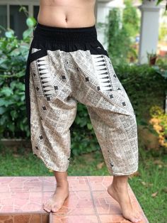 "XL Size - Samurai Pants (Unisex) Elastic Waist MATERIAL: 100% Cotton APPROX MEASUREMENT: Waist: 28\"- 48\" Length: 29\" Around Ankle: 20 inch Category: harem pants, Japanese, ninja pants, pants, samurai, samurai pants, samurai-pants-elastic-waist, thai pants Shipping & Handling * Parcels will be ship via DHL Express FEATURE: Handmade Ethically, Breathable, Unisex, Comfortable to Wear & Stylish. SIZE: One size fits most, elastic waist (see measurement) GENDER: M/F ❤️ PAYMENT We accept pa Traditional Harem Pants For Yoga, Traditional Harem Pants With Pockets For Festivals, Traditional Harem Yoga Pants, Traditional Harem Bottoms With Pockets, Traditional Wide Leg Harem Pants For Yoga, Traditional Long Harem Pants With Pockets, Traditional Baggy Harem Pants, Traditional Harem Pants For Yoga With Pockets, Traditional Yoga Harem Pants With Pockets