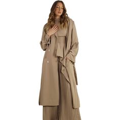 Elevate your outerwear game with our Pleated Trench Coat. Perfect for sophisticated style in any weather, this coat features elegant pleating that adds a touch of flair to the classic trench design. Pair it with your favorite outfits for a look that's both timeless and chic, keeping you warm and fashionable all season long. Shop more coats!! Model is wearing a small Available in Cream Ash Taupe Long sleeves Pleats in back Buttons Tie at waist 100% polyester Still not sure which size to get? Ask Pleated Long Sleeve Fall Blazer, Chic Pleated Long Sleeve Outerwear, Chic Long Sleeve Pleated Outerwear, Chic Long Pea Coat With Belted Cuffs, Chic Spring Pea Coat With Belted Cuffs, Elegant Pea Coat With Belted Cuffs And Long Sleeves, Elegant Pea Coat With Belted Cuffs For Fall, Elegant Pea Coat With Belted Cuffs, Elegant Fall Pea Coat With Belted Cuffs