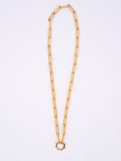 This statement piece is a combination of our most chunky Fiona chain closed with our beaded Love Lock. This is the perfect base for any Narrative Pendant to help you create a look that is completely unique and special. This 18" refined paperclip chain has a large, beaded center Love Lock that opens to add the pendants of your choice. Metal: 14K Gold-Filled Chain with a Vermeil LockTotal length: 18" inch Fiona Grande Chain Everyday Pendant Chain Necklace With Paperclip Chain, Everyday Pendant Necklace With Paperclip Chain, Yellow Gold Chunky Chain Paperclip Necklace, Yellow Gold Necklace With Chunky Paperclip Chain, Gold-tone Oval Link Paperclip Chain Jewelry, Gold-tone Jewelry With Oval Link Paperclip Chain, Gold Plated Necklaces With Lobster Clasp And Rectangular Links, Gold Plated Necklaces With Rectangular Links And Lobster Clasp, Elegant Pendant Necklace With Paperclip Chain