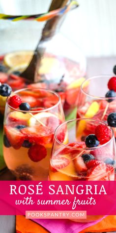 rose sangria with summer fruits in glasses