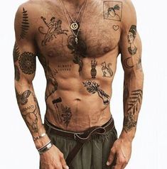 a man with many tattoos on his chest