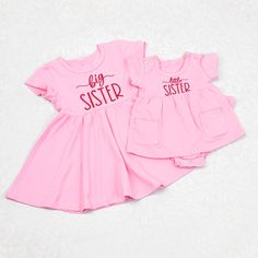 This set is too cute for words! Matching big sister/little sister dresses are sure to catch everyone's attention.  Big Sister dress is short sleeve twirl dress ,little sister dress is a short sleeve bodysuit  dress with 2 pockets. Both dresses are light to medium weight cotton blend with stretch and embroidered. * Pink dresses, hot pink /fuchsia thread  * colors may vary depending on your monitor/phone screen.