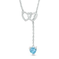 Reflect the love you share with the December-born woman in your life with this sparkling and heartfelt lariat necklace. Created in sterling silver, this sweet design features a 5.0mm heart-shaped sky-blue topaz drop that suspends from a duo of open hearts - one shimmering with diamond accents. So charming, this 17.5-inch rope chain necklace is buffed to a brilliant luster and secures with a spring-ring clasp. Blue Sterling Silver Lariat Necklace Gift, Sterling Silver Lariat Necklace For Anniversary, Heart-shaped Lariat Necklace For Anniversary, Lariat Jewelry For Anniversary And Mother's Day, Adjustable Lariat Necklace For Anniversary, Mother's Day Lariat Necklace For Anniversary, Sterling Silver White Gold Lariat Necklace For Anniversary, White Gold Sterling Silver Lariat Necklace For Anniversary, Bridal Crown Crystal