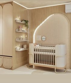 a baby's room with a white crib and shelves on the wall next to it