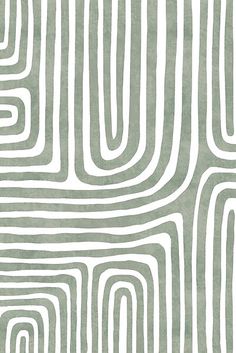 an abstract green and white pattern on paper