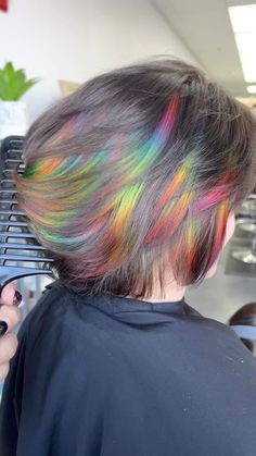 Briauna Conino on Instagram: "Some fun peekaboos for my amazing client. Thank you for making the trip to come see me 🥰 . . . #mermaidhair #pulpriot #pulpriothair #framar #unicornhair #rainbowhair #follow #lasvegassalon #lasvegas #behindthechair #lookbook #lasvegashairstylist #lasvegashair #hendersonhairstylist #nevadahairstylist #lasvegasstylist #hairporn #mermaidians #hairslayerz #peekaboo #prism #highlights" Ribbon Hair Color, Prism Highlights Black Hair, Iridescent Black Hair, Prism Highlights Hair, Rainbow Highlights Short Hair, Prism Highlights Brown Hair, Prism Hair Color Short, Short Hair Rainbow Color, Rainbow Dyed Hair Underneath