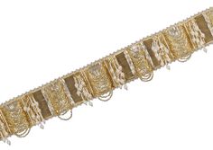 The ruched waist belt gold silver is hand embroidered with luminous gold and silver Japanese micro beads & baroque pearls in a pave’ application. Ornamental scallop tassels & wisply baroque fringes adorn the surface of this belt. Gold Beaded Bridal Belt For Party, Elegant Gold Bridal Belt For Reception, Festive Gold Embroidered Bridal Belt, Gold Embellished Bridal Belt For Festive Occasion, Festive Gold Embellished Bridal Belt, Elegant Embellished Gold Trims, Elegant Gold Embellished Trims, Gold Bridal Belt For Festive Party, Festive Gold Bridal Belt For Party