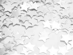 silver stars are scattered on a white background