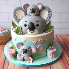 there is a cake with koalas on it