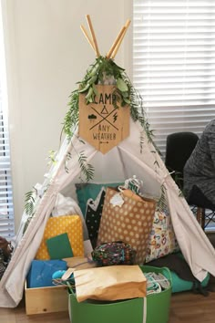 a teepee tent filled with lots of different items