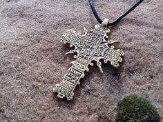 "A copy of the historical findings. The Cossack cross. 16-18 century Description: Double-sided pendant Metal: bronze or silver 925 Weight: approx. 9 g Size: approx. 5,5 x 3,4 cm \\ 2,16\" x 1,33\" Hole size: 2 mm \\ 0,07'' The product will be shipped complete with a cotton cord black color. *The color of real item may be a little different from the pictures due to the display of screen. Bronze - metal, which over time can oxidize and darken on the air. All my creations are intentionally patinate Spiritual Bronze Crucifix Necklace, Bronze Crucifix Necklace For Spiritual Purposes, Byzantine Cross Necklace With Engraving, Bronze Cross Spiritual Jewelry, Medieval Engraved Cross Jewelry, Spiritual Bronze Cross Jewelry, Bronze Spiritual Cross Jewelry, Bronze Crucifix Necklace As Gift, Bronze Crucifix Necklace For Gift