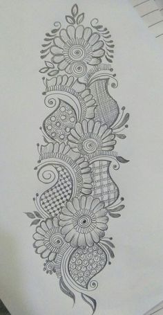 a drawing of an ornate design on paper