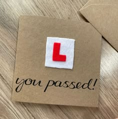 a piece of paper with the letter l on it