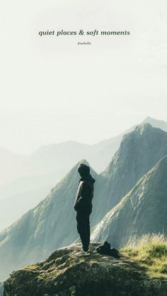 a person standing on top of a mountain