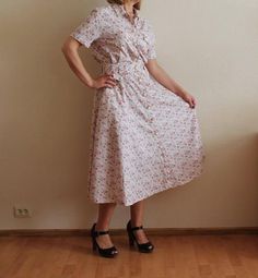 "Vintage Dress Floral Flower Print Short Sleeve Button up Long Midi Summer Romantic Sundress Button Down Ivory Pink Green Boho Shown on model M Measurements(lying flat): Length: 48\"/ 122 cm Shoulders:16.5\"/ 42 cm Sleeve 8.5\"/ 22 cm Bust:19.5\"/ 49 cm Waist:14 2/8\"/ 36 cm Condition: excellent Vintage Condition Please check measurements to insure a proper fit. Remember to allow yourself some extra room for movement. You can compare these with something from your closet that fits you well. Plea Button-up Cotton Floral Print Dress, Cotton Floral Print Button-up Dress, Cotton Button-up Dress With Floral Print, Cream Buttoned Dress For Daywear, Cream Button Dress For Daywear, White Button-up Feminine Dress, White Feminine Button-up Dress, White Button-up Feminine Shirt Dress, White Button-up Shirt Dress With Floral Print