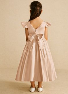 If you are looking for a classic dress for your girl, look no further. Violetta is our adorable satin ballgown dress. She features flutter cap sleeves, a V-back, and a ruched skirt with a bow tie back belt. Satin Flower Girl Dresses, Satin Ballgown, Tea Length Flower Girl Dress, Ballgown Dress, Satin Flower Girl Dress, Pink Ball Gown, Pink Flower Girl Dresses, Ruched Skirt, English Rose