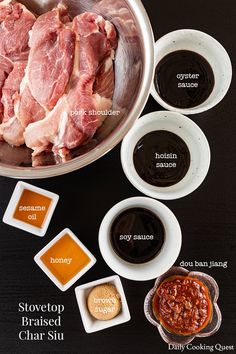 ingredients for slow cooker pork chops laid out in bowls on a black surface