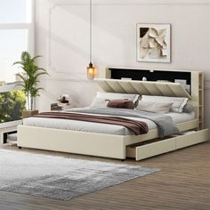 a bedroom with a bed, nightstands and rug on the floor in front of it