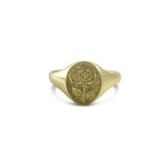 Flower power. This simple and pretty signet ring is 14k yellow gold. The hand engraved flower on the face of the signet is super delicate and chic. This is the perfect right hand everyday ring. 14k yellow gold Signet ring Hand engraved Please allow 2-4 weeks for production and shipping. Dark Academy Aesthetic, Heart Signet Ring, Academy Aesthetic, Oval Signet Ring, Affordable Fine Jewelry, Engraved Flower, Everyday Ring, Anatomical Heart, Gold Signet Ring