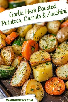 garlic herb roasted potatoes, carrots and zucchini on a baking sheet with text overlay that reads garlic herb roasted potatoes, carrots & zucchini