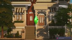 a green umbrella is in front of a large house