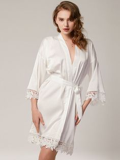 Must have bride bridesmaid robes -made of highest quality charmeuse satin, super soft, light and comfy. Different from normal satin, the buttery soft satin looks and feels like real silk. Gives you the feeling of being at an exclusive spa at home! It will feel so good against your skin. It won't get worse even after repeated washings; Self Tie closure Machine Wash Love the look of bride bridesmaid robes with lace trim? Same—we can't get enough of them! Check out these pretty bridal party robes f Elegant Solid Satin Sleepwear, Satin Wedding Night Sleepwear, Elegant Satin Sleepwear For Spring, White Satin Sleepwear For Wedding Night, Cream Satin Sleepwear For Summer, White Satin Wedding Sleepwear, Summer Wedding Satin Robe, Summer Wedding Satin Sleepwear, Elegant White Satin Finish Sleepwear