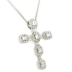 Be glamorous in every detail with this stunningly unique cross pendant necklace featuring an invisible-set cross in 1.96ct tw of twinkling baguette-cut diamonds. Experience the power of true luxury and elegance with this timeless piece! Metal: 18K White GoldDiamond Shapes: 60 Round Brilliant-cuts 0.80ct tw, Baguette -cut 1.16ct twDiamond Weight: 1.96ct t.w.Cross Length: 25mm x 33mmChain: 16" Baguette Cut Diamond, Baguette Cut, Cross Pendant Necklace, Round Brilliant, Cross Pendant, Timeless Pieces, Diamond Cuts, Diamonds, Pendant Necklace