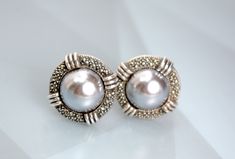 Silver Oval Clip-on Earrings For Formal Occasions, Silver Oval Clip-on Earrings For Formal Events, Elegant Oval Silver Clip-on Earrings, Elegant Silver Oval Clip-on Earrings, Classic Cabochon Clip-on Earrings For Anniversary, Vintage Silver Round Pearl Earrings, Silver Round Clip-on Earrings For Anniversary, Silver Clip-on Round Pearl Earrings, Vintage Sterling Silver Jewelry