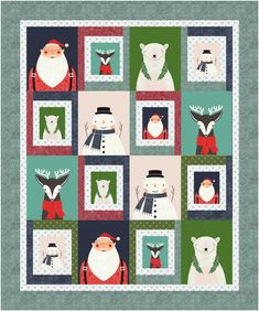 a christmas quilt with polar bears, deers and snowmen on it's sides