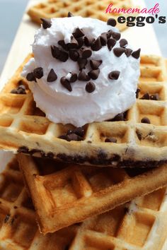 waffles topped with whipped cream and chocolate chips