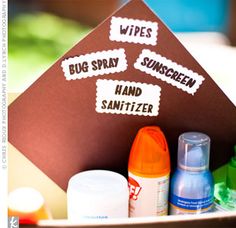 a brown hat with white writing on it that says wipes, bug spray, sunscreen and sanitizer