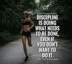 a woman running down a road with a quote on the side saying, discipline is doing what needs to be done, even if you don't want to do it