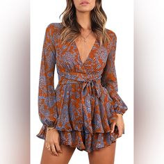 Women’s Long Sleeve Orange And Blue Romper/Jumpsuit. Zips In The Back And Ties Can Be Worn In The Front Or Back. Size Small/Dress Size 4. Polyester, Machine Washable. Brand New, Never Worn Before And In Perfect Condition! Fitted Orange Jumpsuits And Rompers For Fall, Orange Long Sleeve Jumpsuit For Fall, Casual Orange Jumpsuits And Rompers With Floral Print, Casual Orange Jumpsuit With Floral Print, Fitted Printed Orange Jumpsuits And Rompers, Fitted Orange Printed Jumpsuits And Rompers, Baggy Sleeves, Black Denim Overalls, Black Floral Jumpsuit