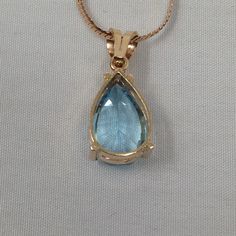 "Vintage Estate 14Kt Topaz Pendant , Chain and Earring Set. Chain is approx 17 3/4 inches long. PROFESSIONAL INSURANCE APPRAISAL of $1600.00 This set has been professionally appraised and that written appraisal will accompany the set when sold. Since I am not an expert regarding this item, I have relied on the expertise of the certified professional appraisal. The following details about this pendant, chain and earrings are from a Certified Gemmologist-Certified Gold Smith appraisal: \" A 14 kar Yellow Gold Briolette Gemstones For Formal Occasions, Formal Yellow Gold Briolette Gemstones, Elegant Yellow Gold Pear-shaped Gemstones, Elegant Pear-shaped Yellow Gold Gemstones, Teardrop Gemstone 14k Gold Jewelry, 14k Gold Teardrop Gemstone Jewelry, Blue Topaz Teardrop Necklace For Formal Occasions, Formal Blue Topaz Teardrop Necklace, Formal Teardrop Blue Topaz Necklace