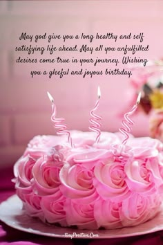 a birthday cake with pink roses on it and the words, may god give you a long healthy and self - satisfied life ahead